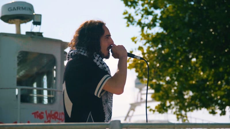 Irish, Palestinian rapper Speit, performing aboard The Kate.